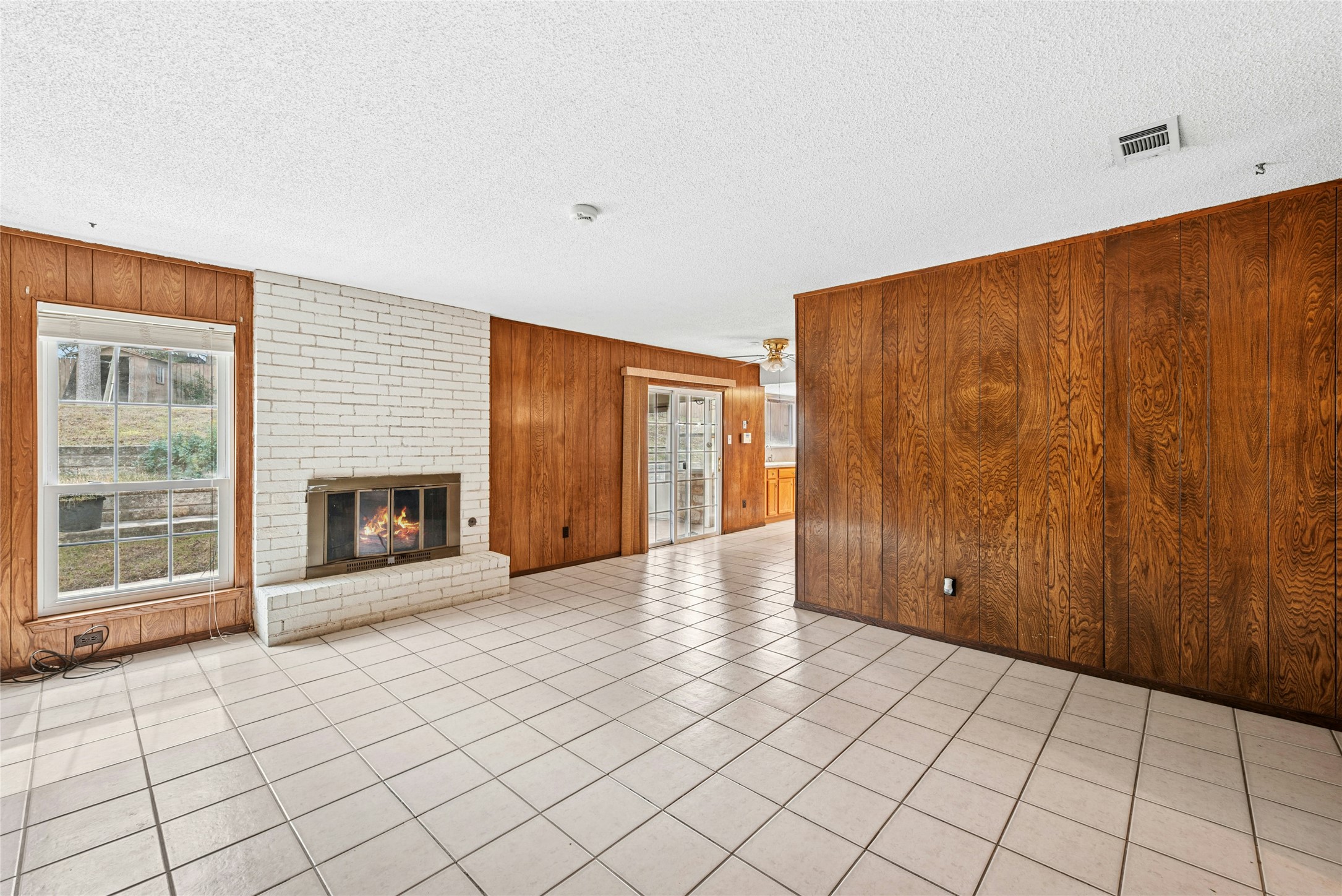 1444 Salem Meadow Circle Austin, TX 78745 - Photo 13 of 35 a view of a livingroom with a fireplace