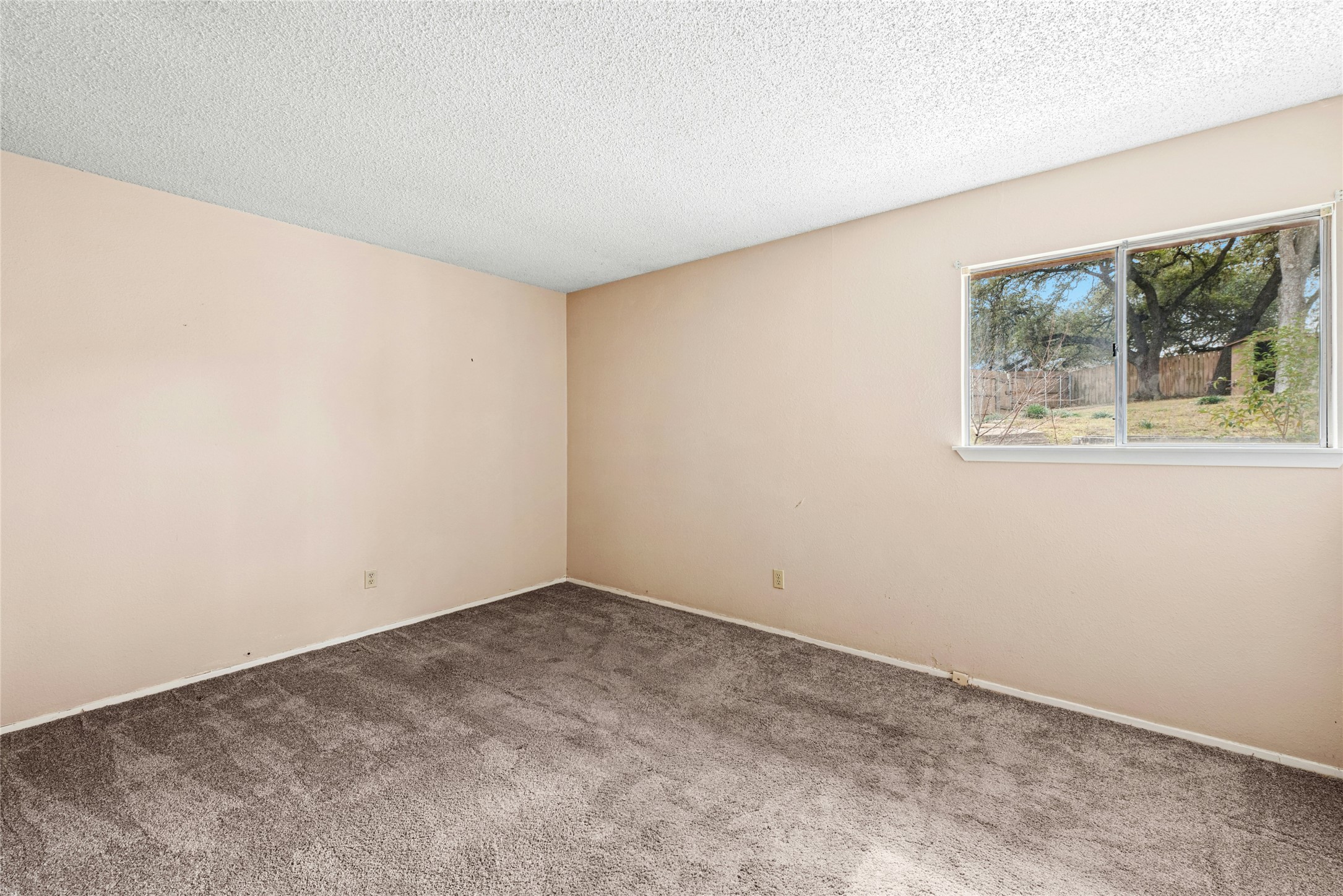 1444 Salem Meadow Circle Austin, TX 78745 - Photo 16 of 35 a view of an empty room with a window