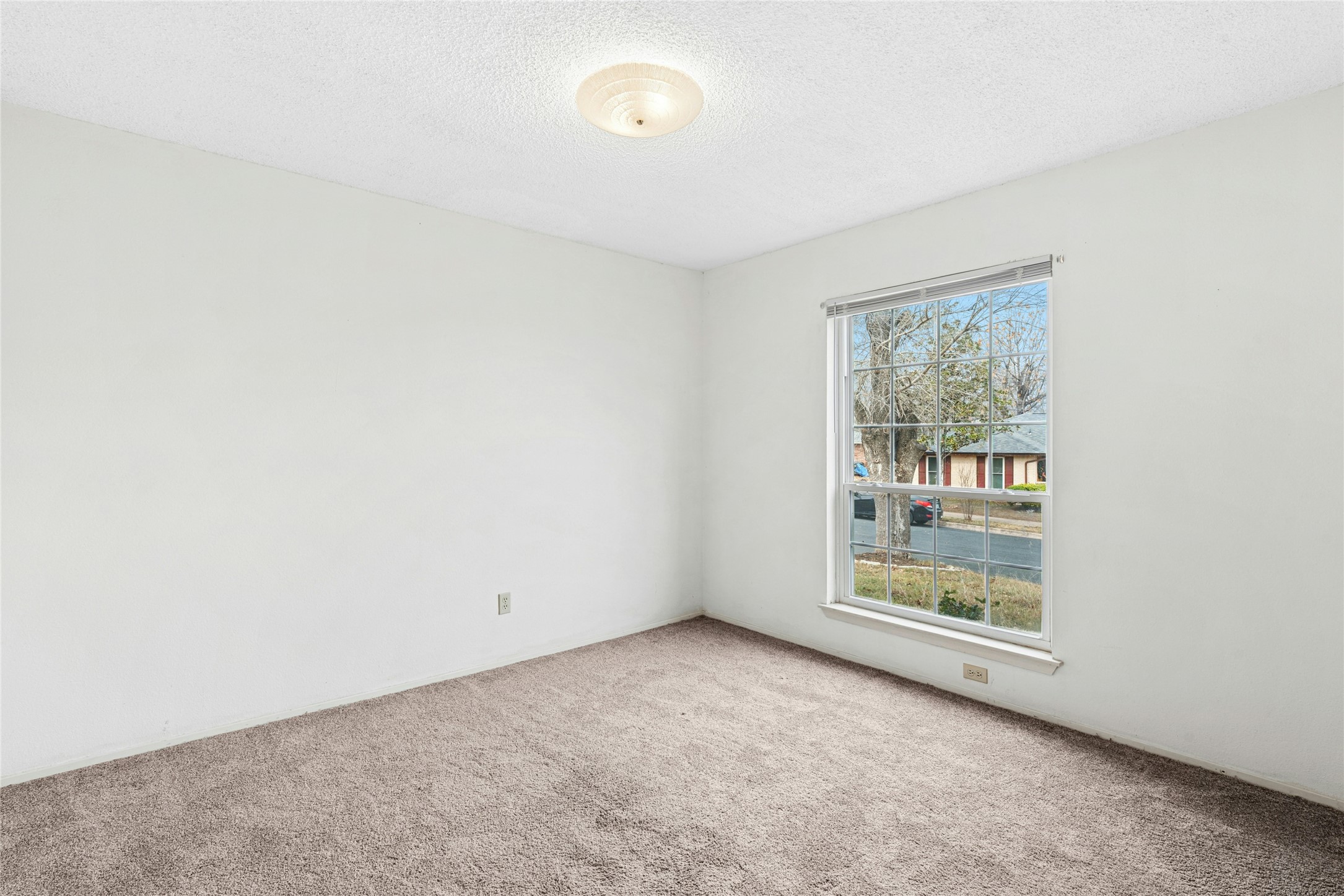 1444 Salem Meadow Circle Austin, TX 78745 - Photo 21 of 35 an empty room with windows