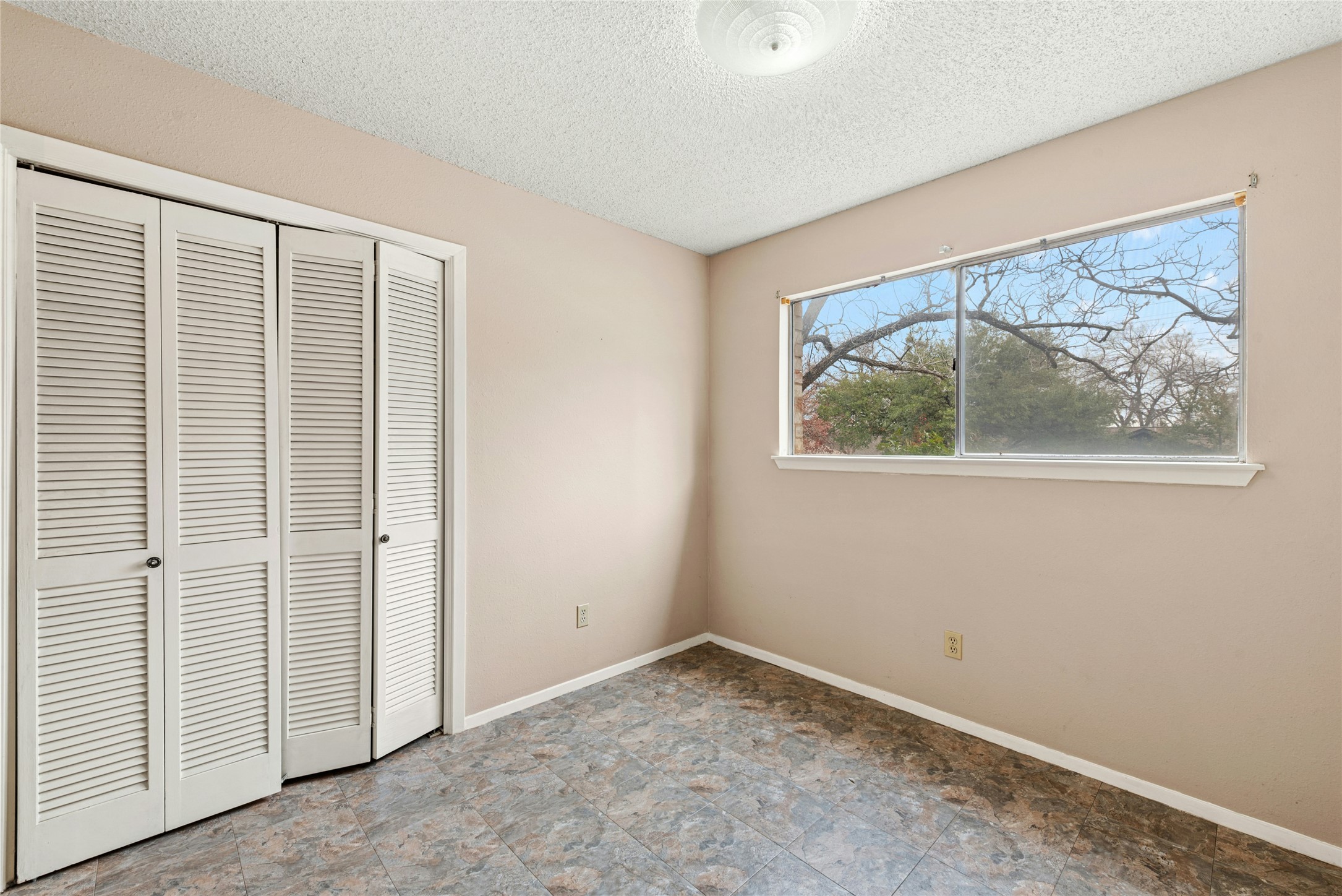 1444 Salem Meadow Circle Austin, TX 78745 - Photo 23 of 35 an empty room with a window