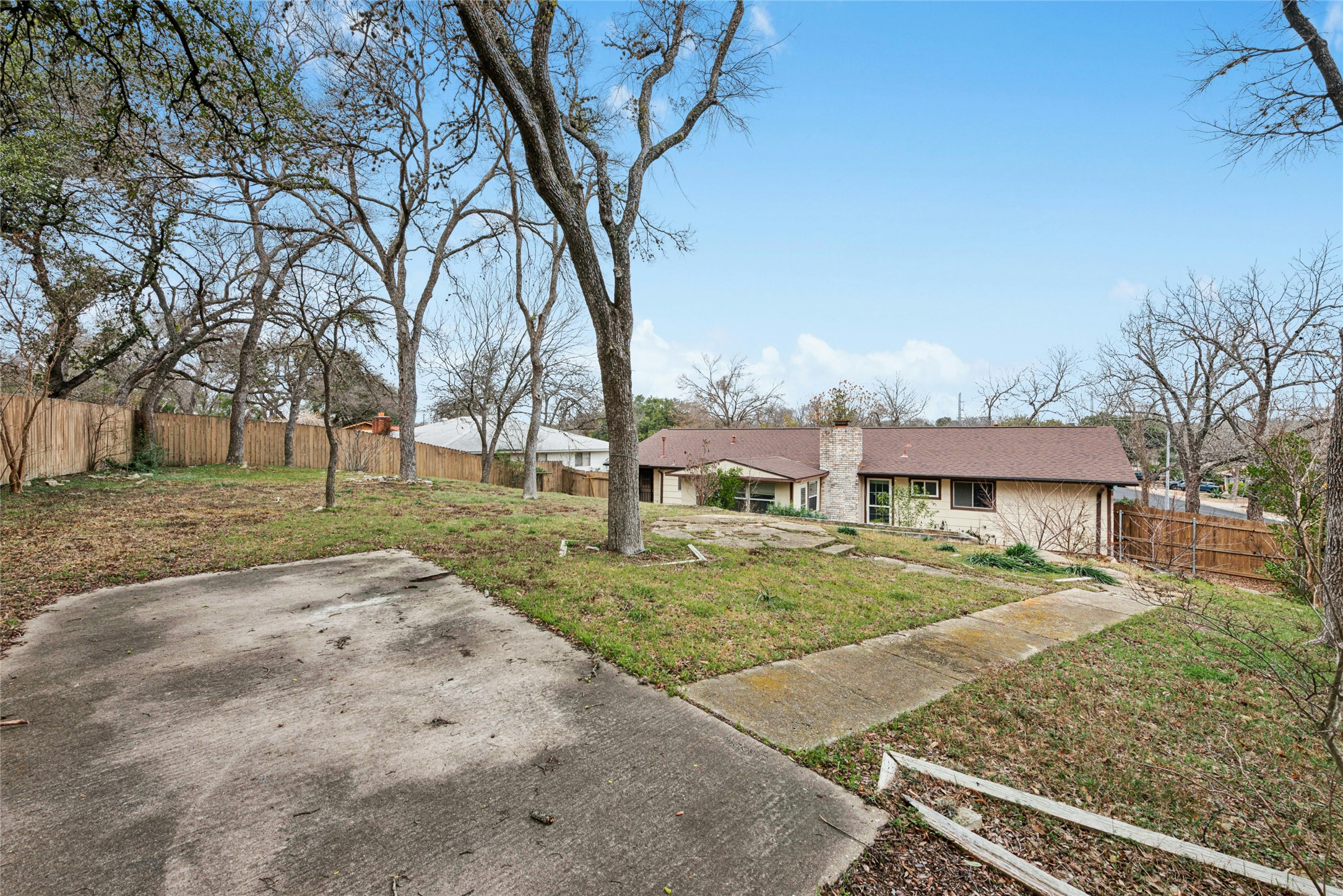 1444 Salem Meadow Circle Austin, TX 78745 - Photo 30 of 35 a view of a house with a yard