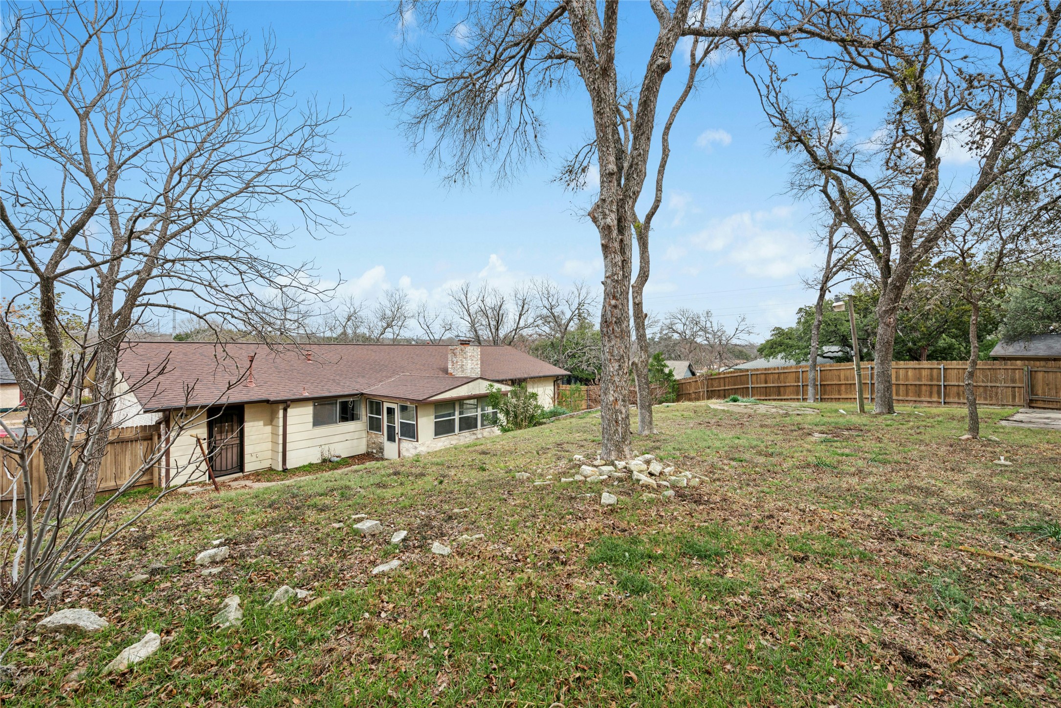 1444 Salem Meadow Circle Austin, TX 78745 - Photo 34 of 35 a view of an house with backyard space and garden