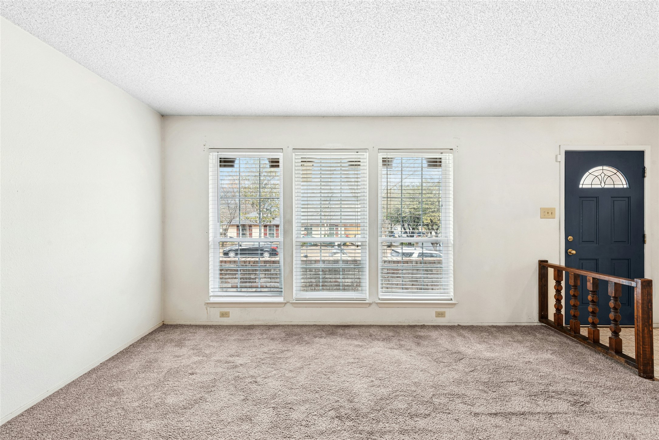 1444 Salem Meadow Circle Austin, TX 78745 - Photo 4 of 35 an empty room with windows