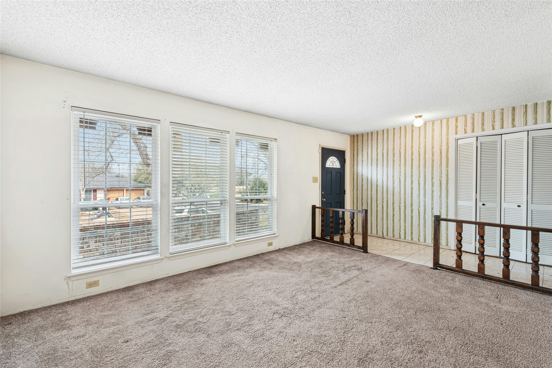 1444 Salem Meadow Circle Austin, TX 78745 - Photo 5 of 35 an empty room with windows