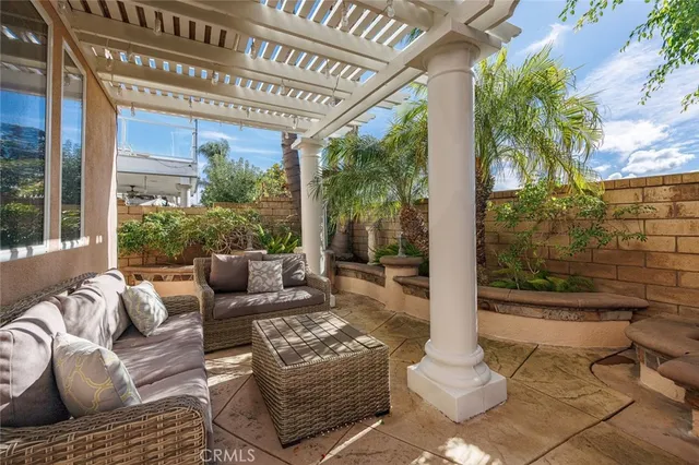 a view of balcony with furniture and outdoor seating