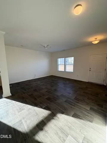a bathroom with a toilet sink and a mirror