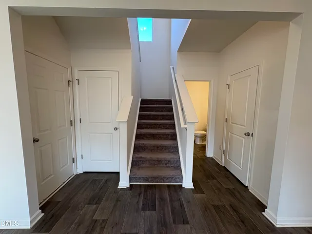 a bathroom with a sink a mirror and a shower