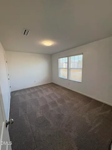 a picture of a room with a white wall and a white wall