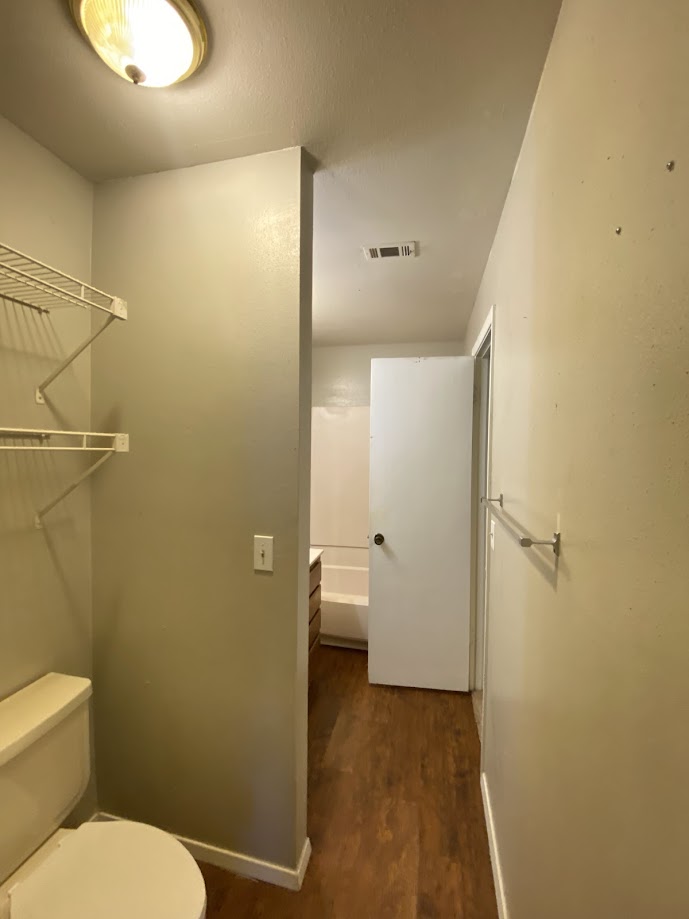 1305 West Villa Maria Road, Unit B104 Bryan, TX 77801 - Photo 13 of 14 a bathroom that has a toilet
