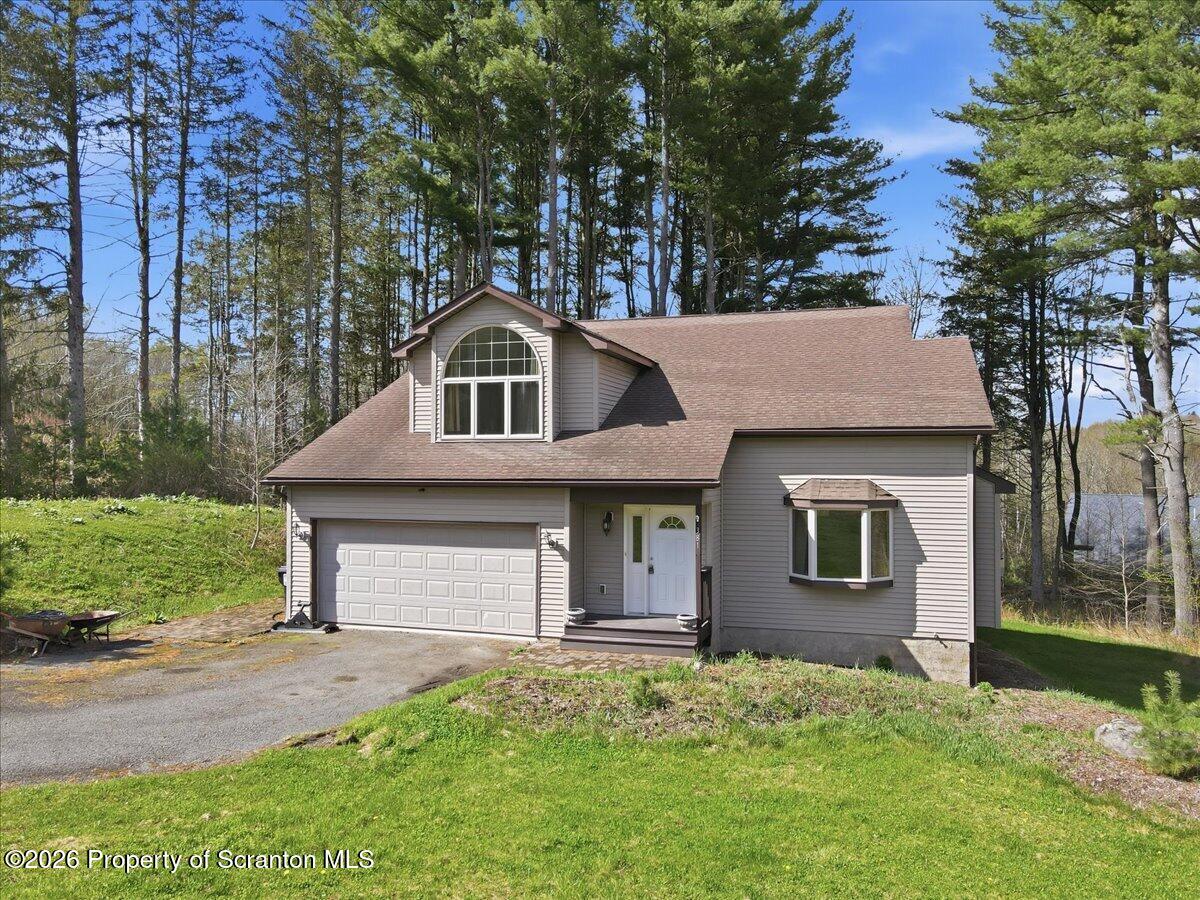 381 Goose Pond Road Lake Ariel, PA 18436 - Photo 2 of 81 front view of a house with a yard