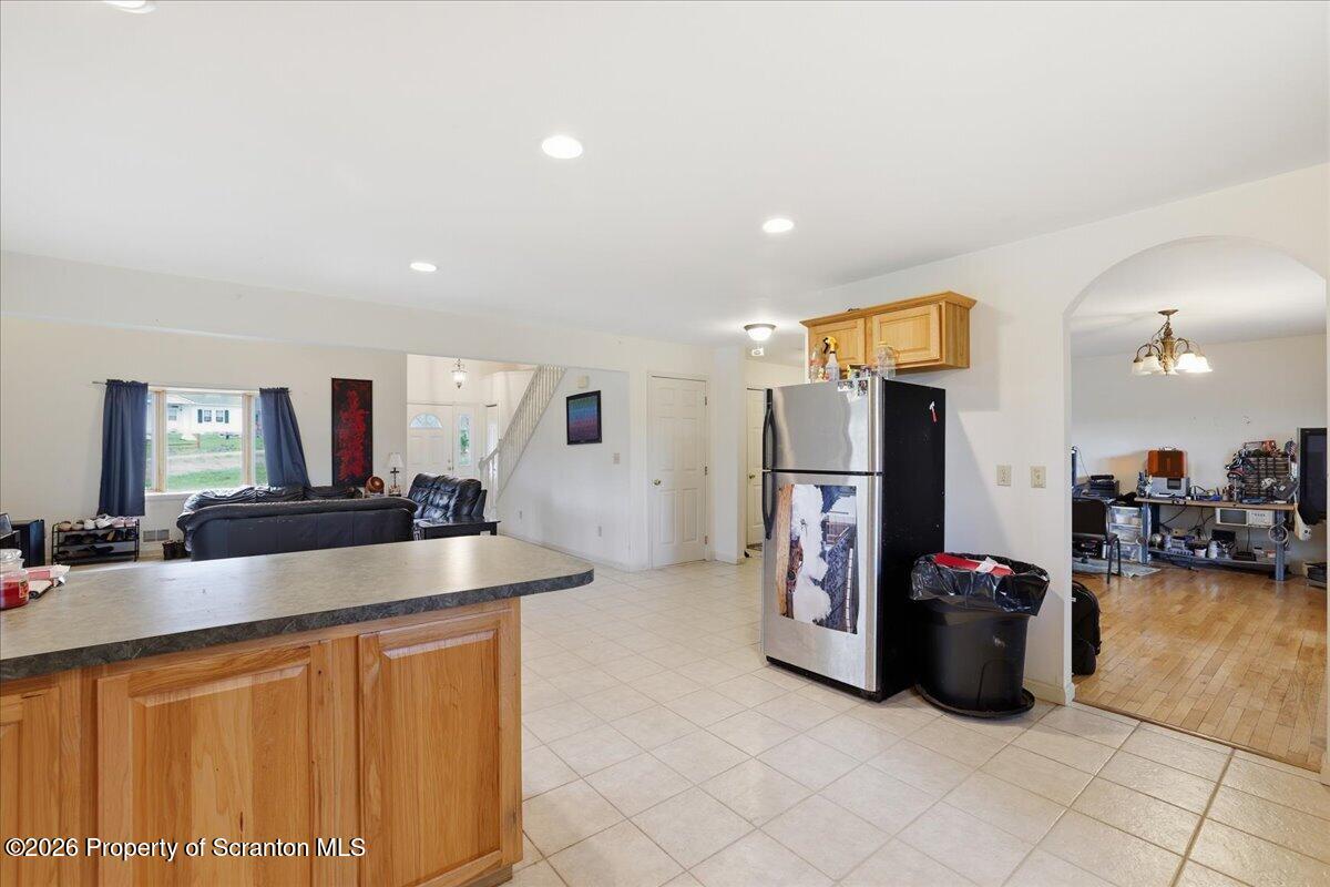 381 Goose Pond Road Lake Ariel, PA 18436 - Photo 24 of 81 a kitchen with stainless steel appliances granite countertop a sink and a refrigerator