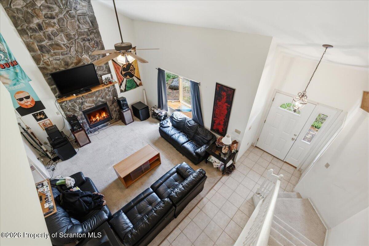 381 Goose Pond Road Lake Ariel, PA 18436 - Photo 27 of 81 a living room with furniture and a flat screen tv