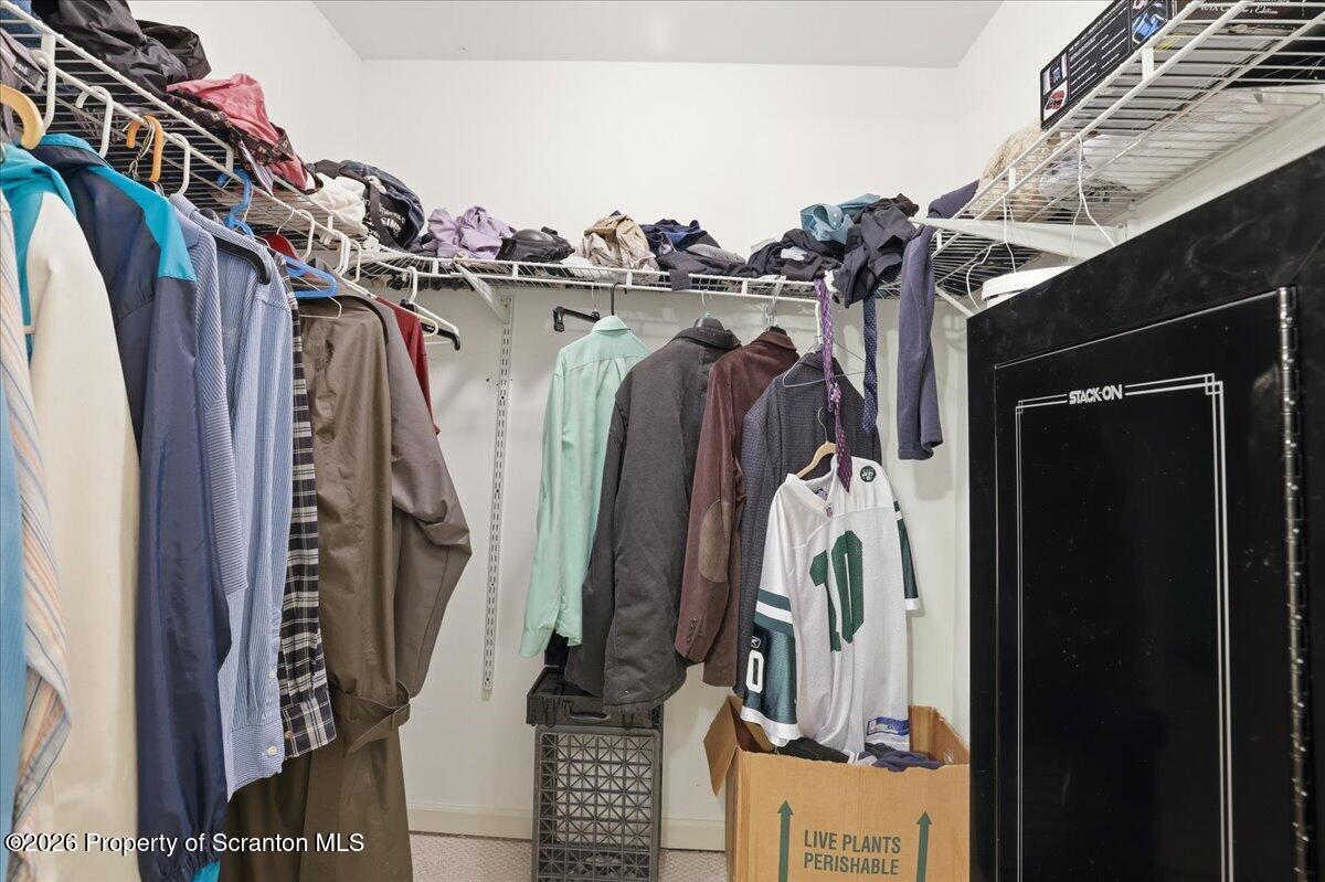 381 Goose Pond Road Lake Ariel, PA 18436 - Photo 47 of 81 a view of walk in closet with clothes and shoes