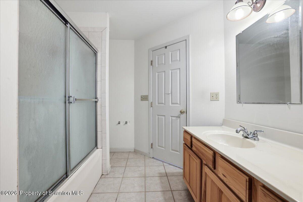 381 Goose Pond Road Lake Ariel, PA 18436 - Photo 49 of 81 a bathroom with a double vanity sink and mirror
