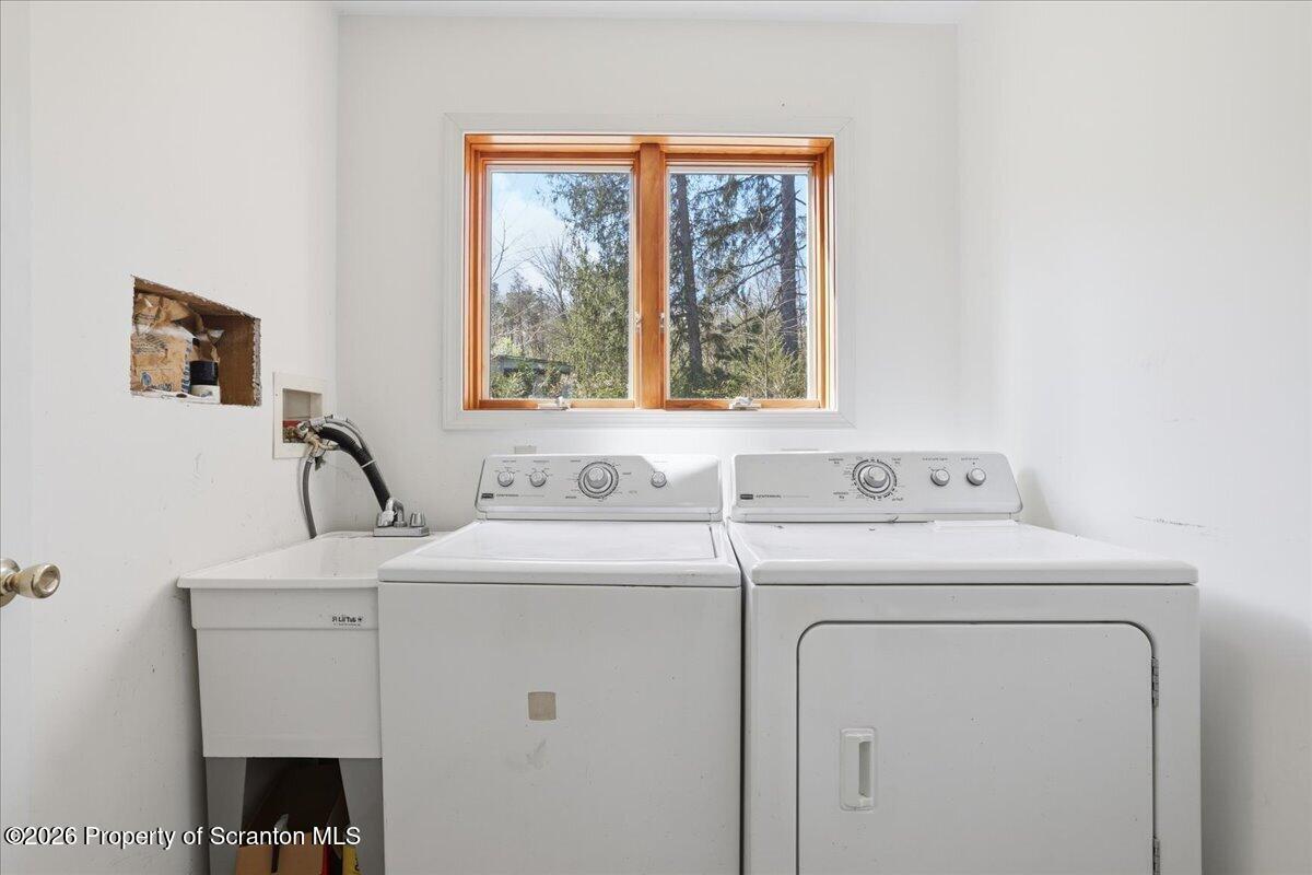 381 Goose Pond Road Lake Ariel, PA 18436 - Photo 53 of 81 a utility room with dryer and washer