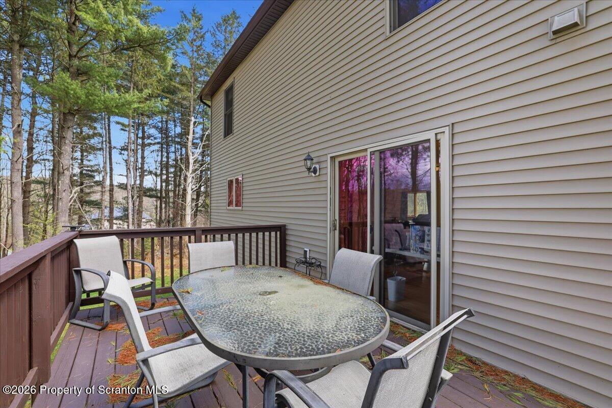 381 Goose Pond Road Lake Ariel, PA 18436 - Photo 63 of 81 a view of a chair and table in the balcony