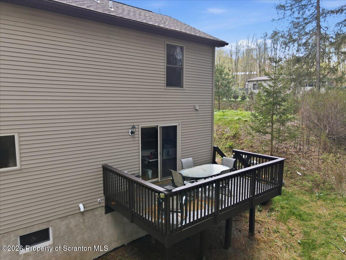 381 Goose Pond Road Lake Ariel, PA 18436 - Photo 66 of 81 a view of a roof deck with couches