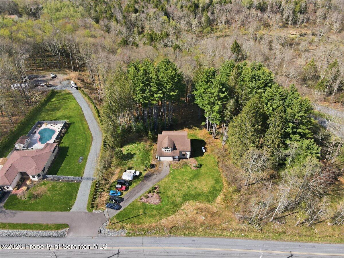 381 Goose Pond Road Lake Ariel, PA 18436 - Photo 79 of 81 an aerial view of a house with a yard basket ball court and outdoor seating