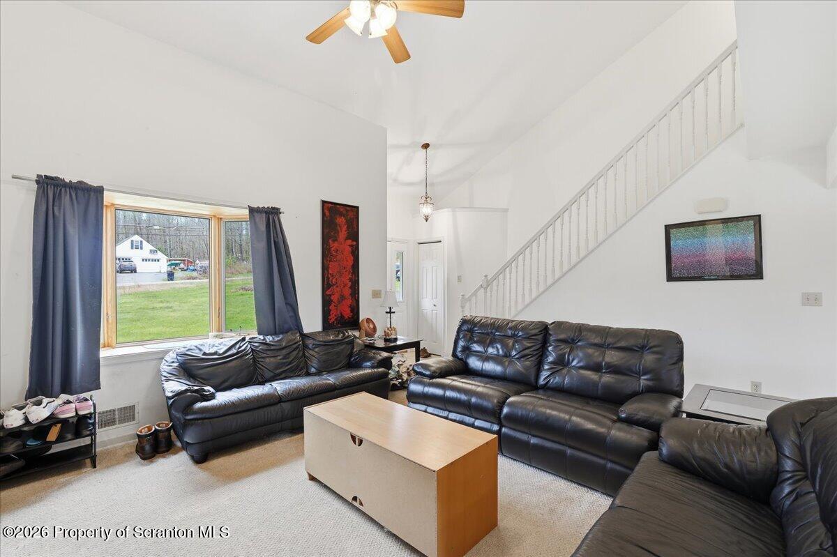 381 Goose Pond Road Lake Ariel, PA 18436 - Photo 10 of 81 a living room with furniture and a large window