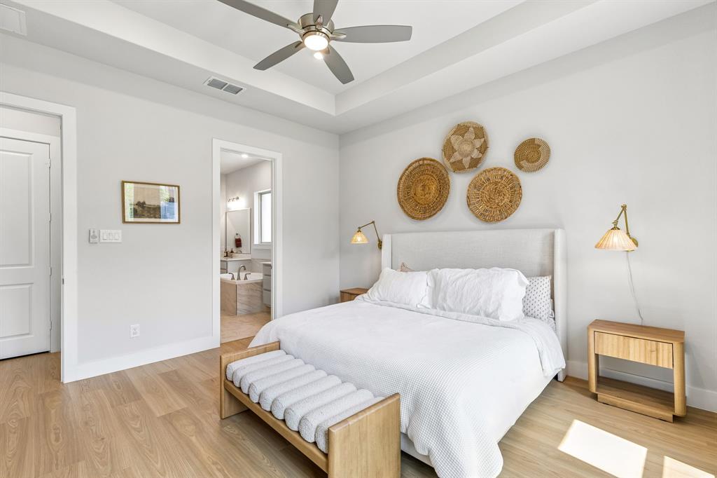 3004 Windy Rdg Road McKinney, TX 75071 - Photo 12 of 40 a bedroom with a bed and painting on the wall