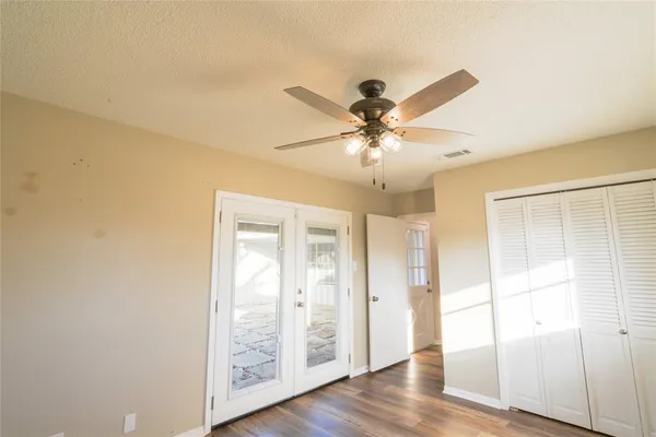 a view of a livingroom with wooden floor