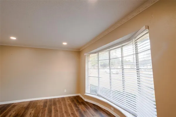 a view of a room with a large window