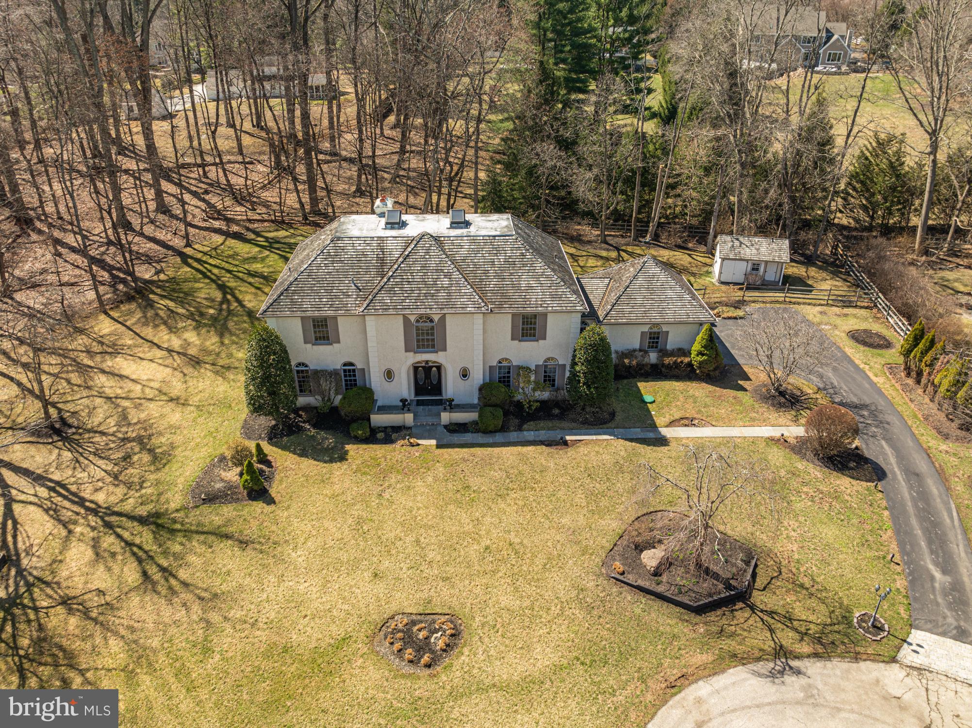 a view of a house with a snow in the yard