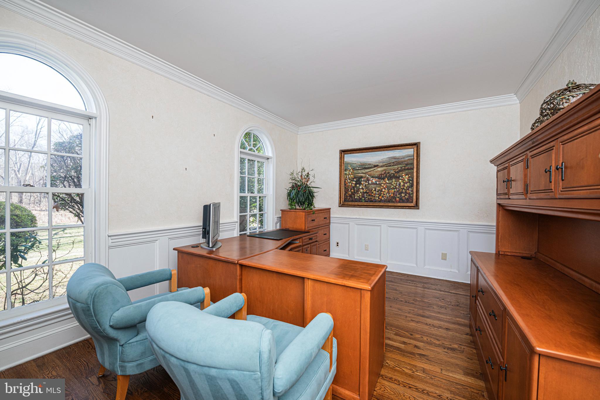 516 Sugartown Road Devon, PA 19333 - Photo 16 of 77 a living room with furniture a fireplace and a large window