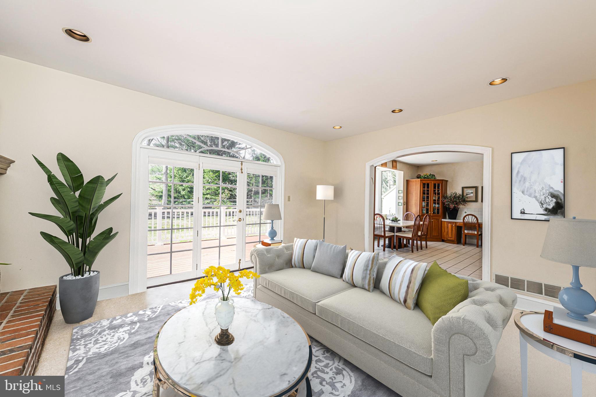 516 Sugartown Road Devon, PA 19333 - Photo 24 of 77 a living room with furniture and a potted plant