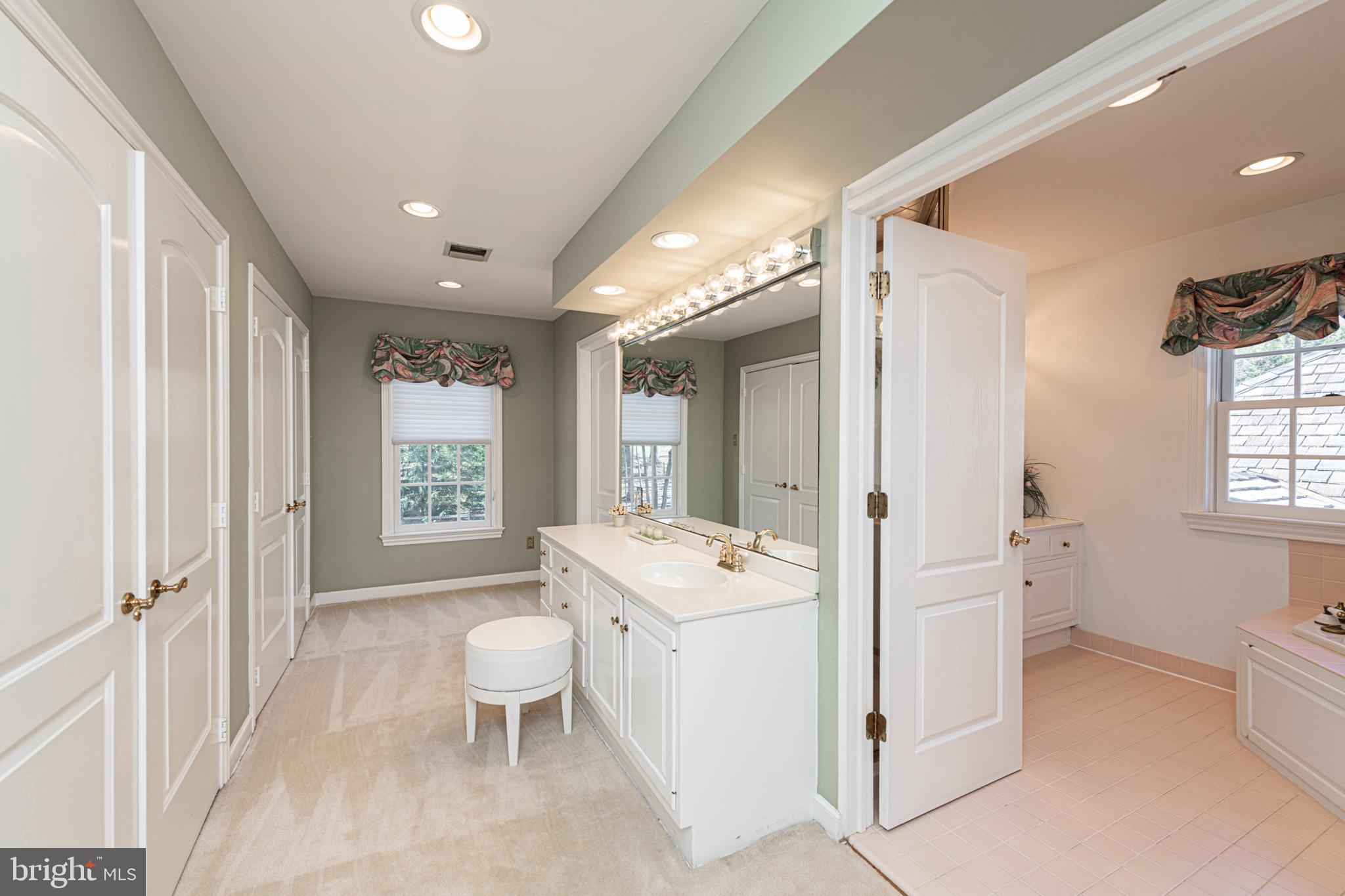 516 Sugartown Road Devon, PA 19333 - Photo 44 of 77 a bathroom with a sink toilet vanity and tub