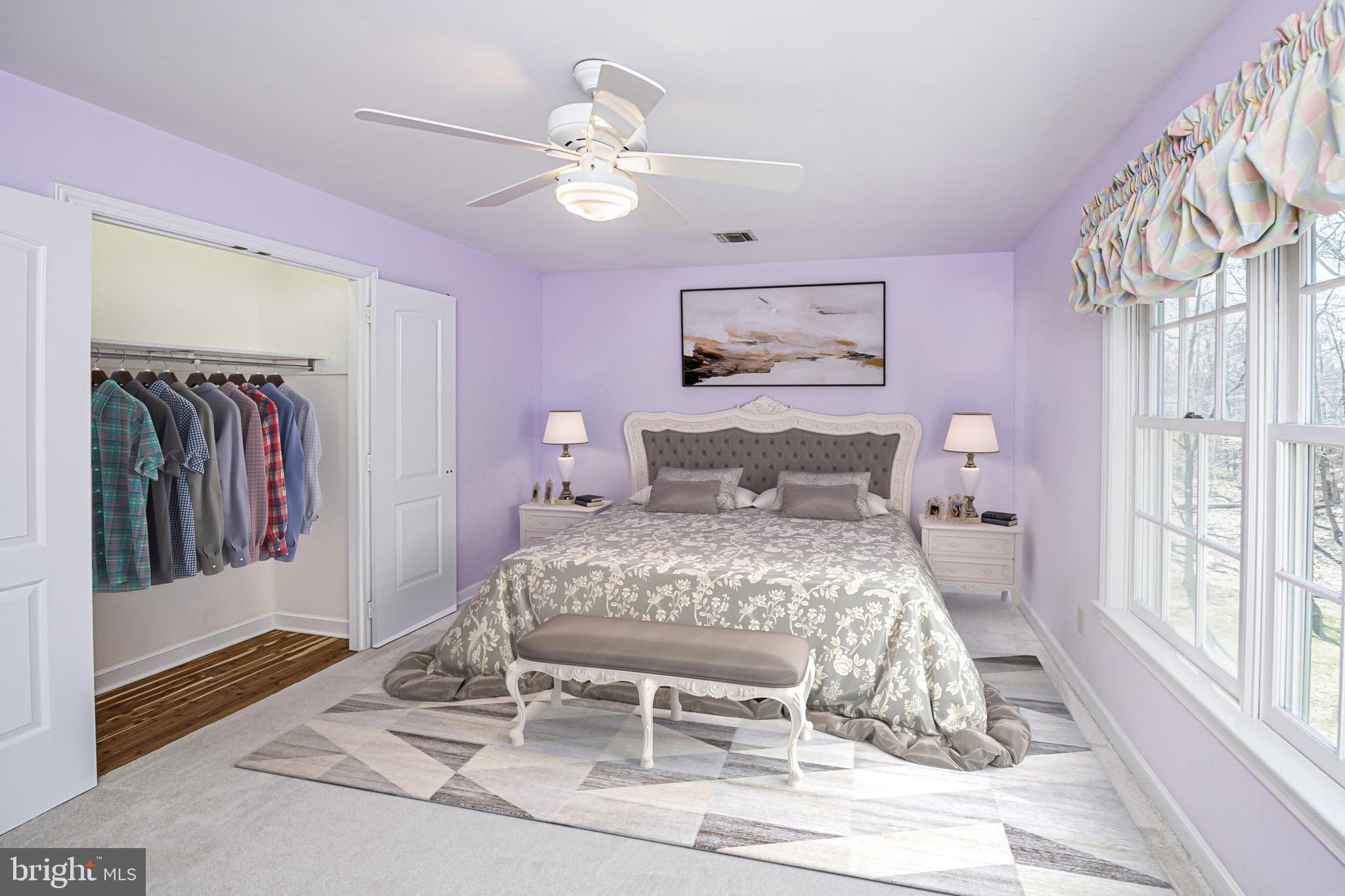 516 Sugartown Road Devon, PA 19333 - Photo 54 of 77 a bedroom with a bed and a chandelier