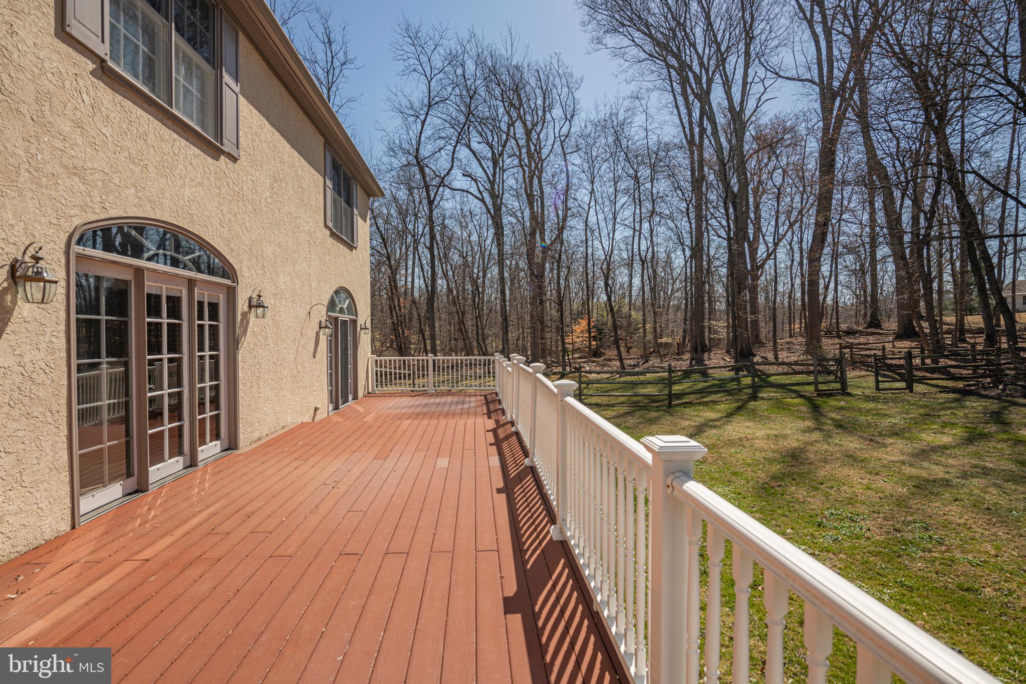 516 Sugartown Road Devon, PA 19333 - Photo 74 of 77 a view of swimming pool with trees in front of house