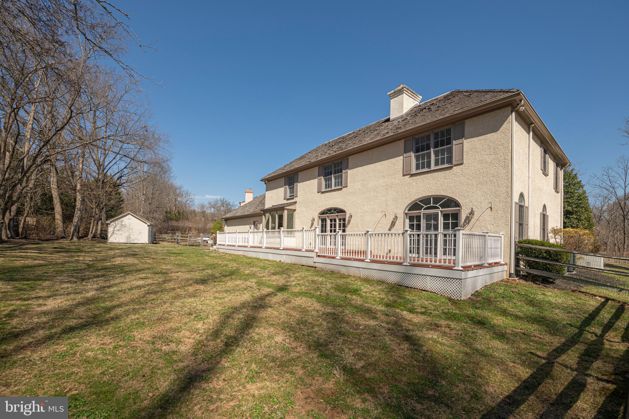 516 Sugartown Road Devon, PA 19333 - Photo 75 of 77 a view of a white house with a yard