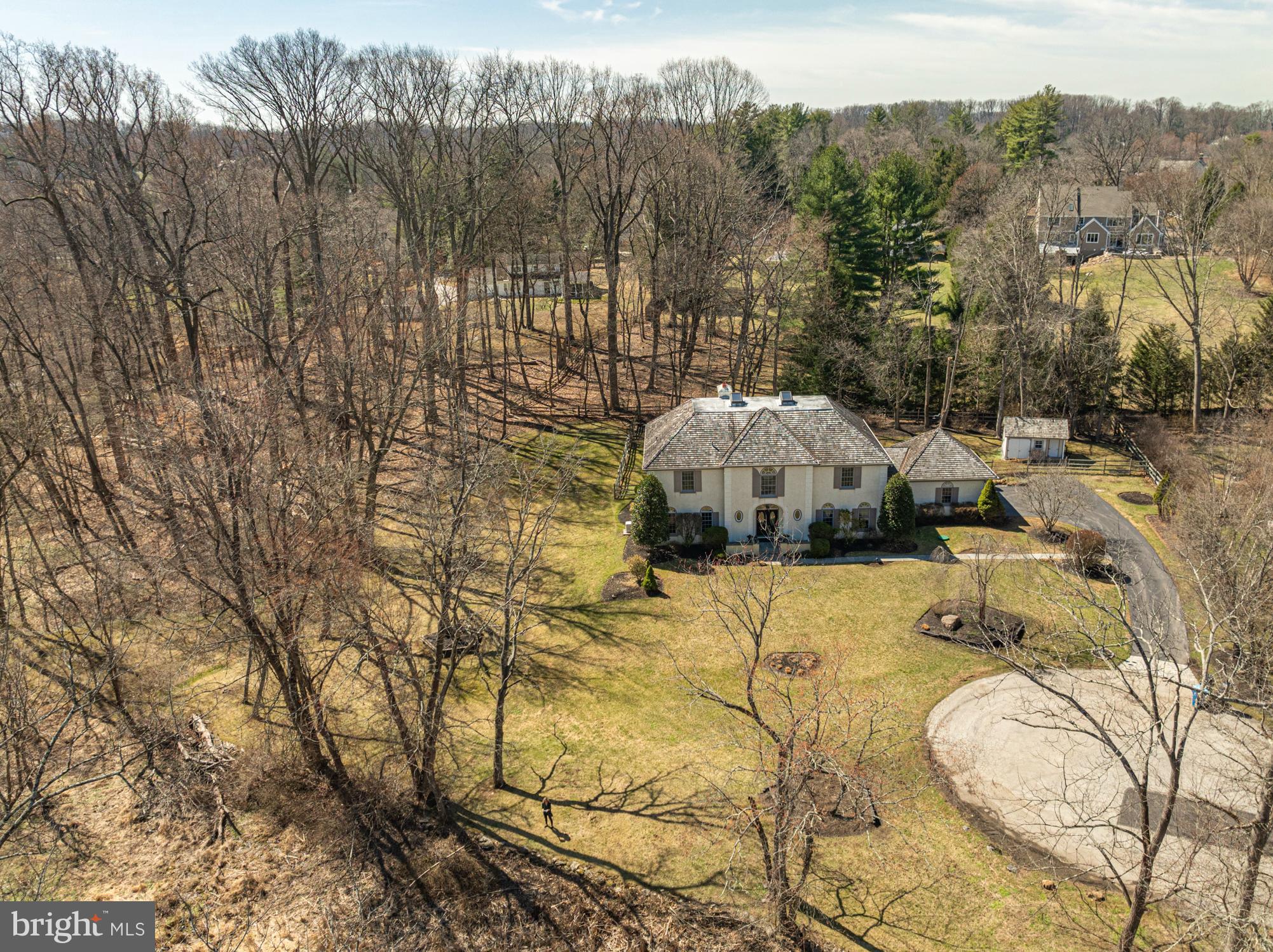 516 Sugartown Road Devon, PA 19333 - Photo 8 of 77 a view of a swimming pool and mountain