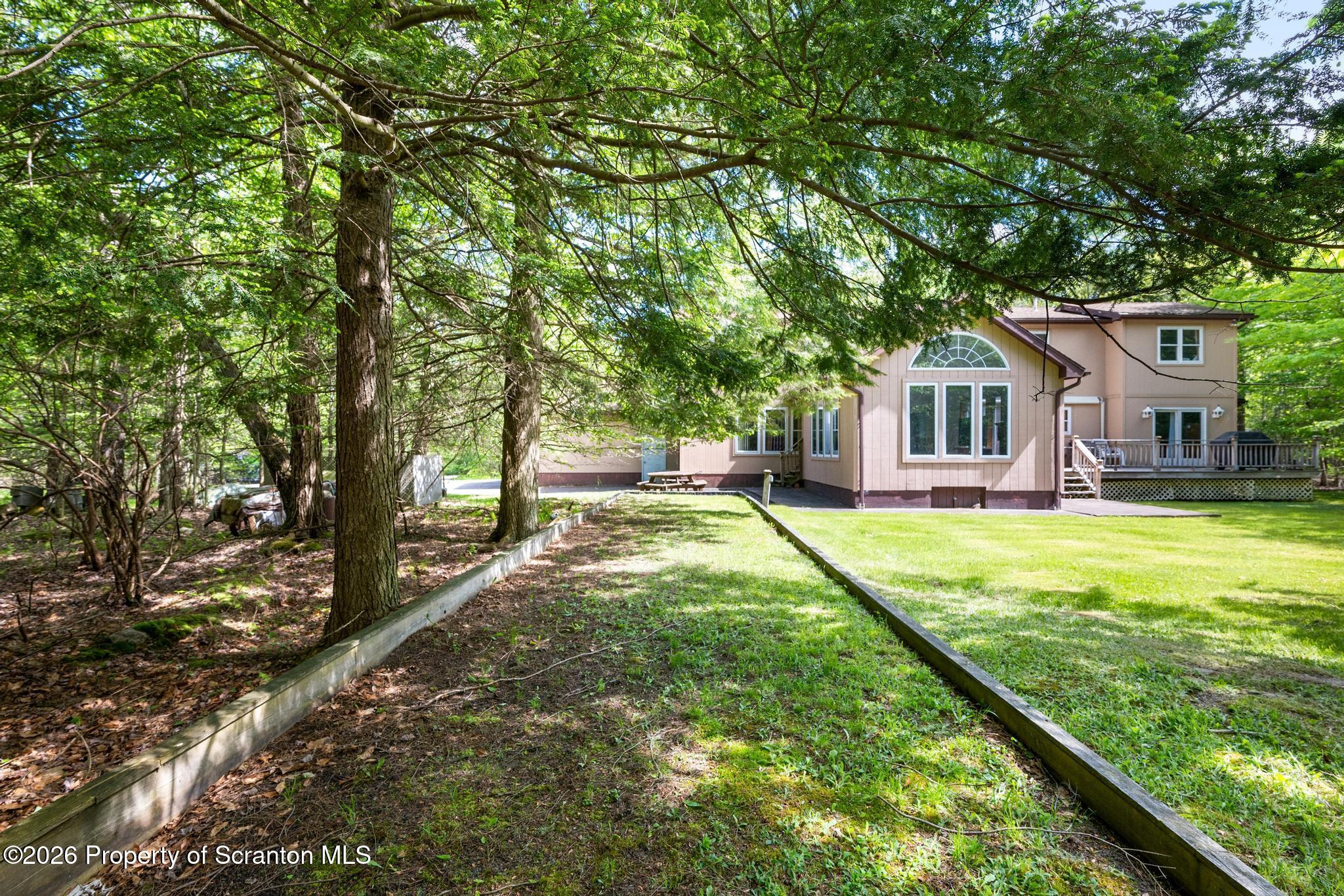 58 Bender Road Gouldsboro, PA 18424 - Photo 47 of 55 a view of house with yard outdoor seating and entertaining space