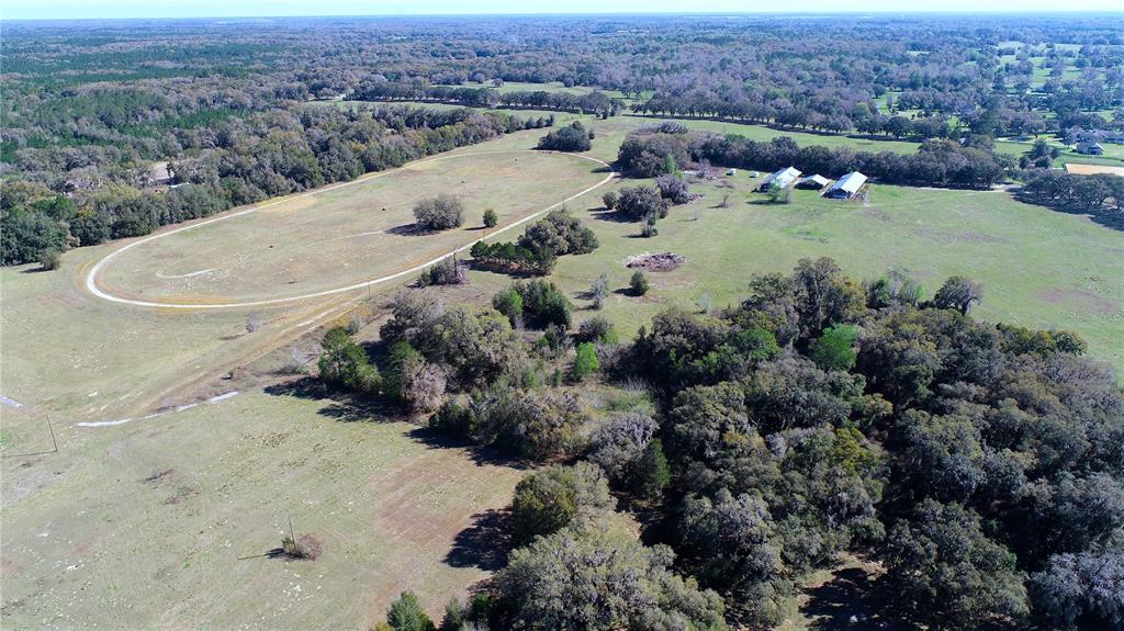 823 Southeast 116th Pl Road Ocala, FL 34480 - Photo 12 of 15 an aerial view of a house with a yard