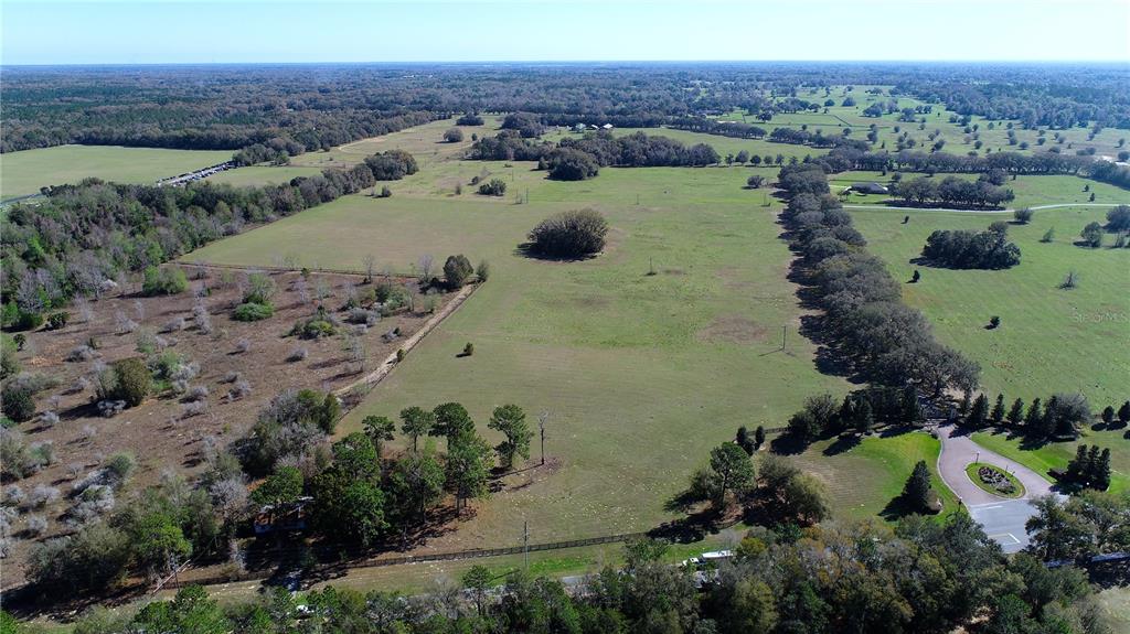 823 Southeast 116th Pl Road Ocala, FL 34480 - Photo 6 of 15 an aerial view of a house with a yard