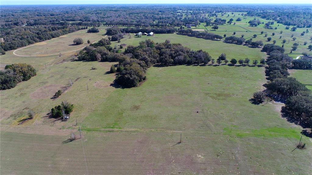 823 Southeast 116th Pl Road Ocala, FL 34480 - Photo 9 of 15 an aerial view of a house with a yard