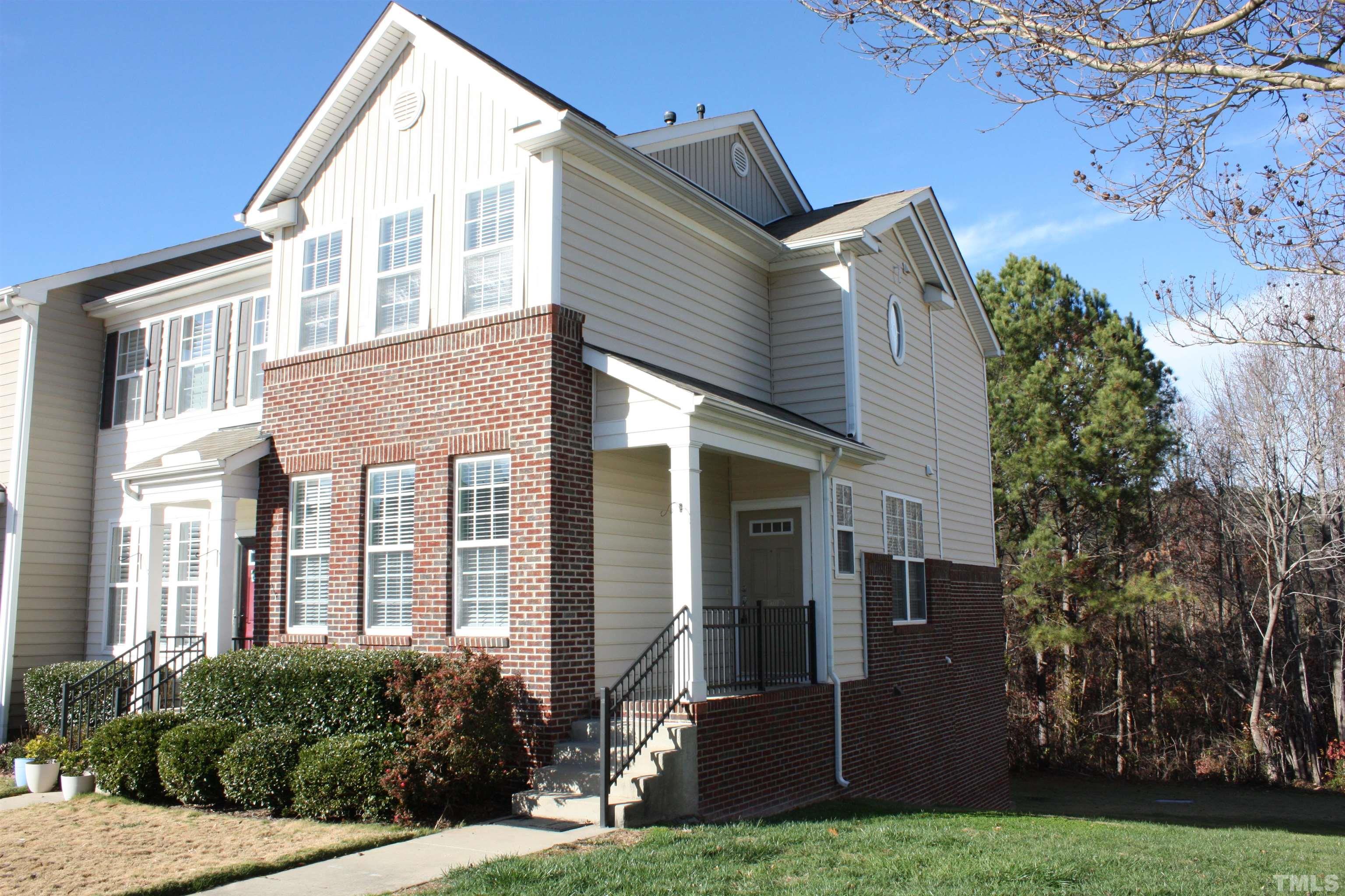 7802 Spungold Street Raleigh, NC 27617 - Photo 1 of 23 front view of house with a yard