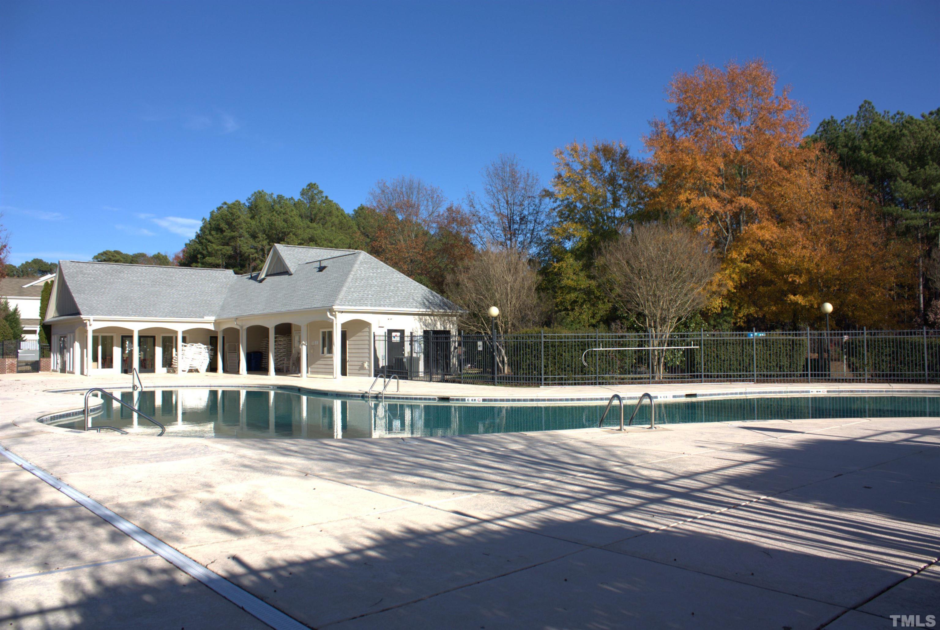 7802 Spungold Street Raleigh, NC 27617 - Photo 23 of 23 a view of a house with a backyard