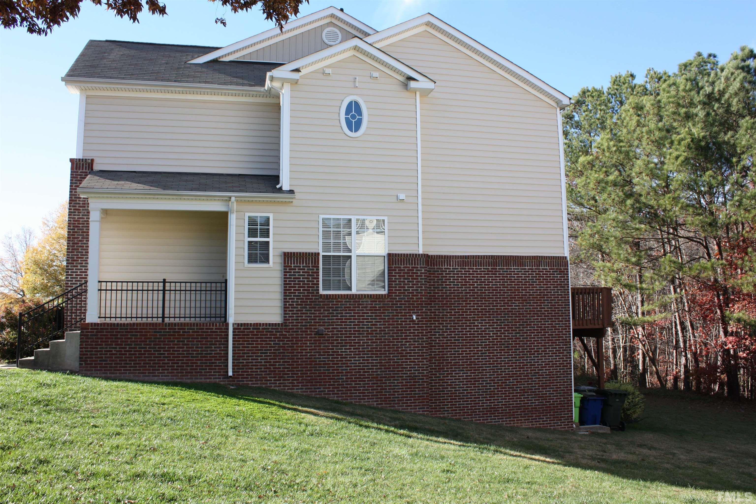 7802 Spungold Street Raleigh, NC 27617 - Photo 3 of 23 a view of backyard of house