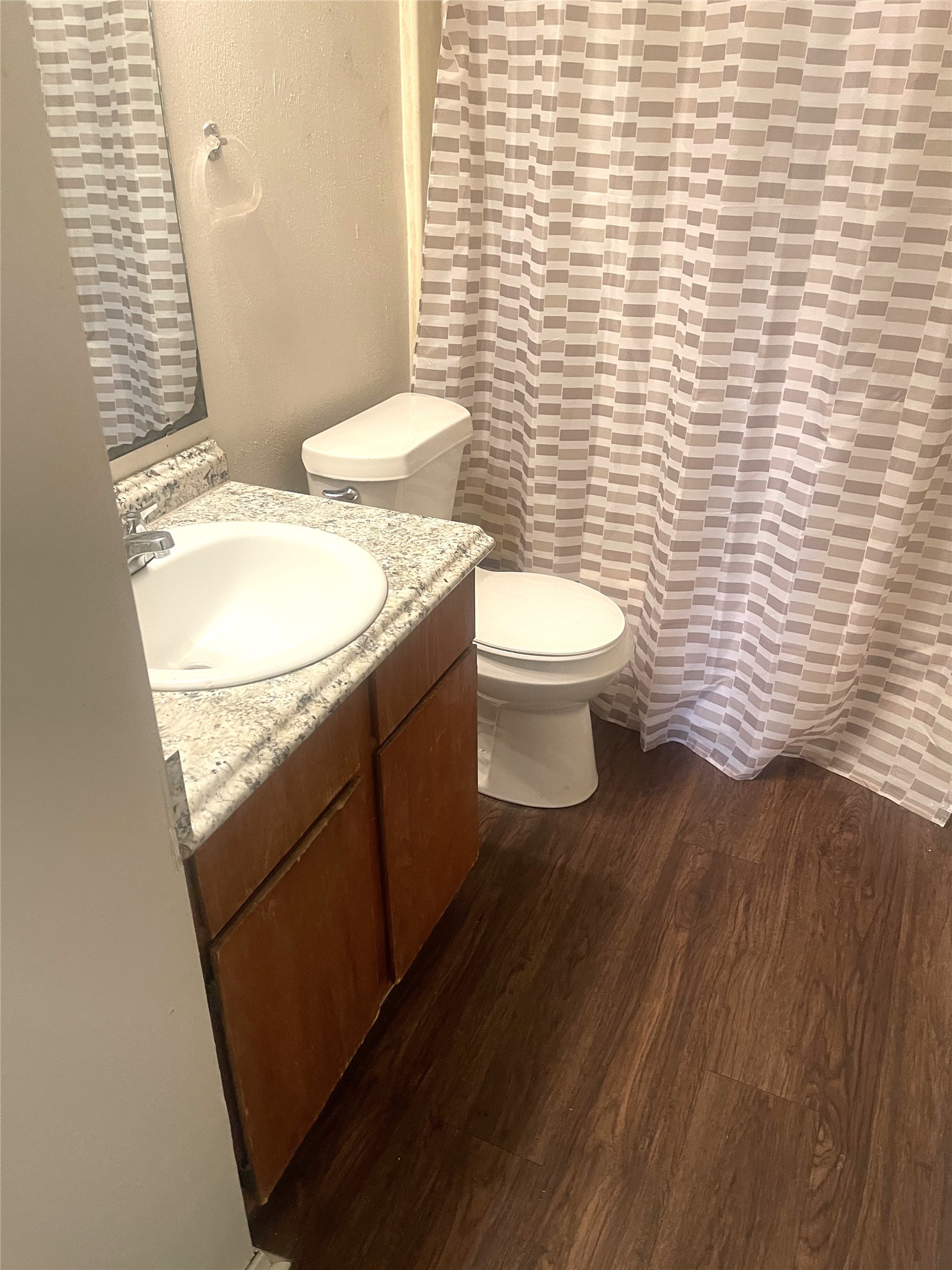 2005 West Loop, Unit D2 Austin, TX 78758 - Photo 15 of 31 a bathroom with a toilet and a sink