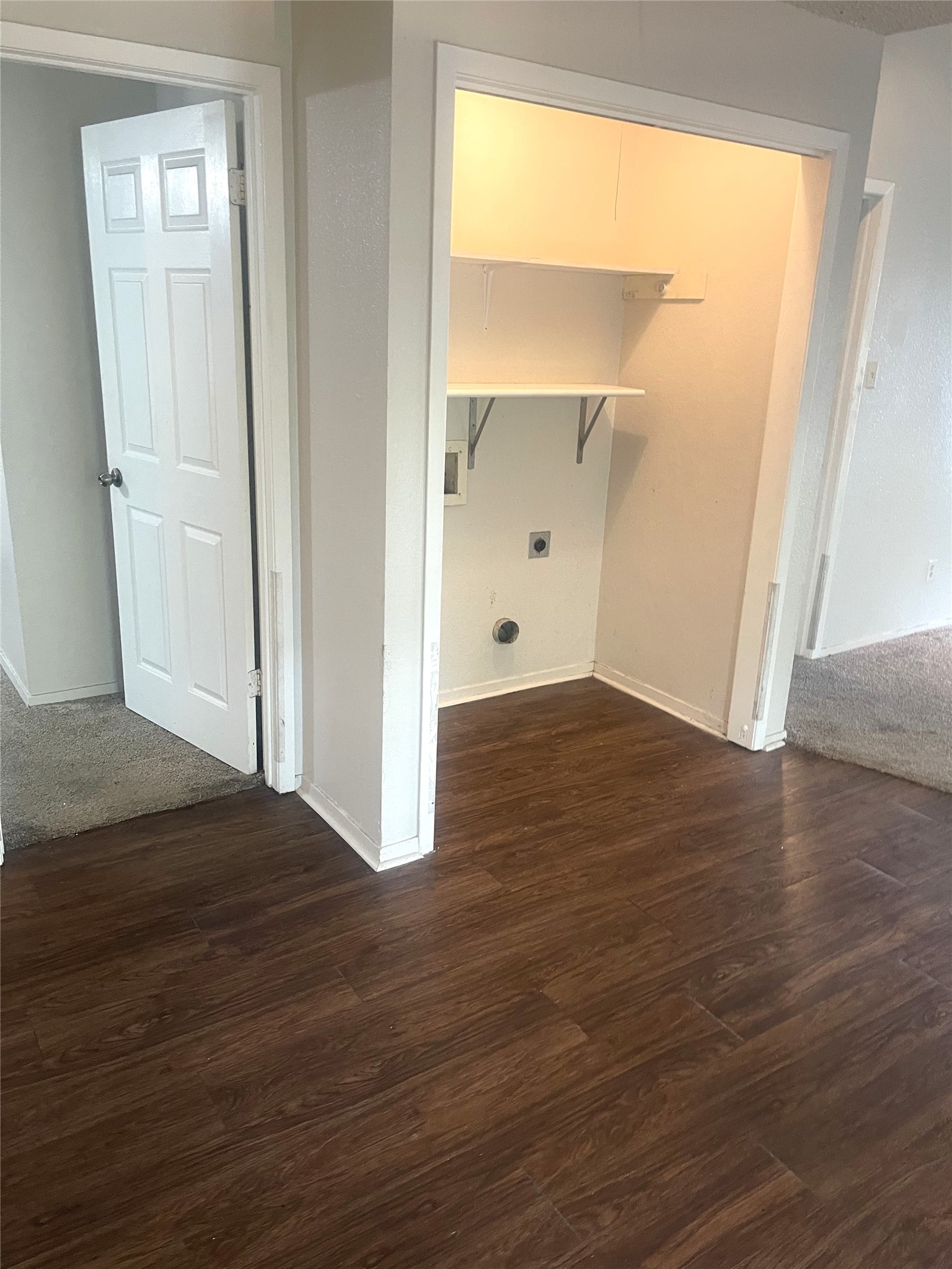 2005 West Loop, Unit D2 Austin, TX 78758 - Photo 16 of 31 an empty room with wooden floor and windows