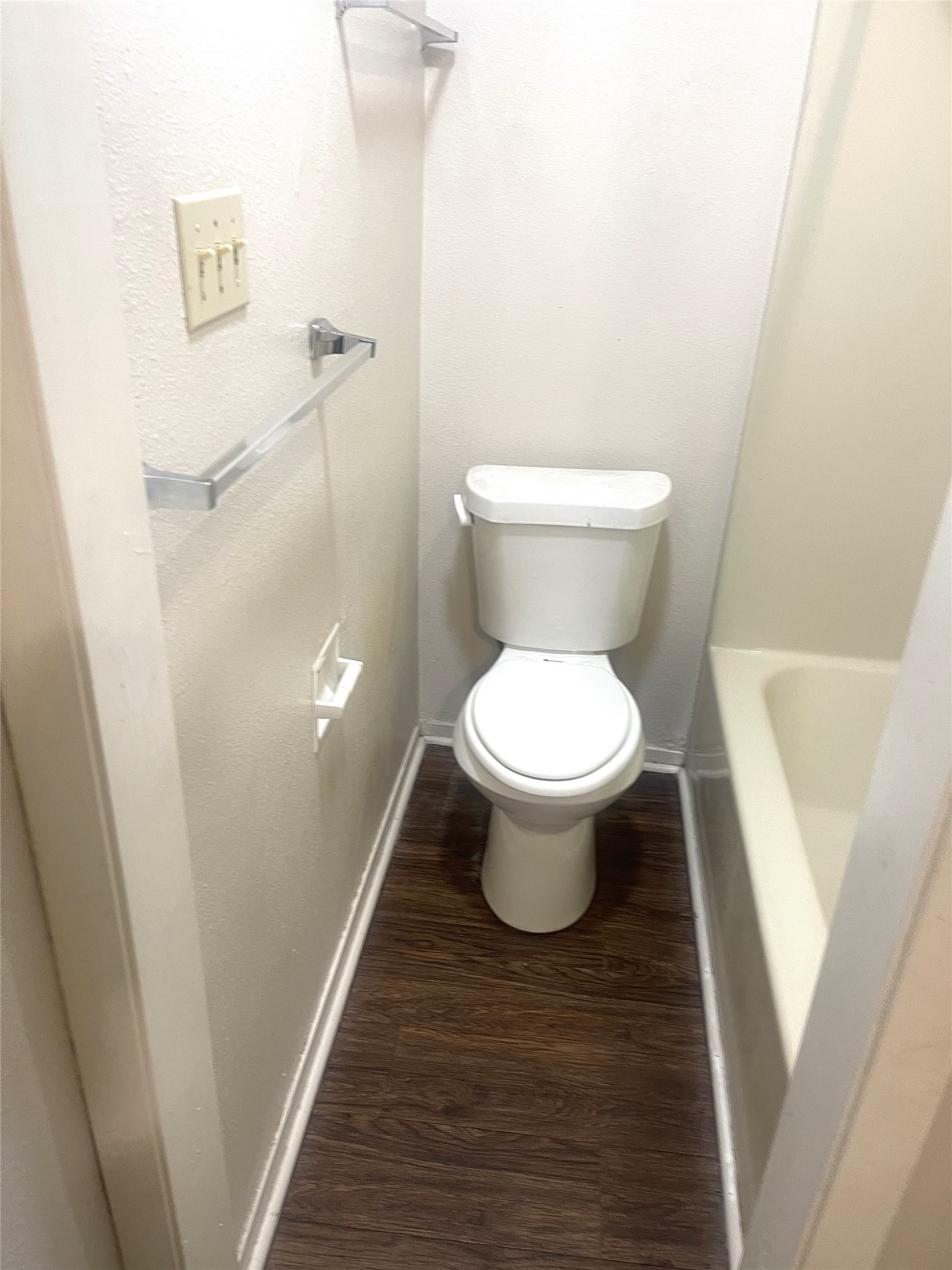 2005 West Loop, Unit D2 Austin, TX 78758 - Photo 6 of 31 a bathroom with a toilet and a shower