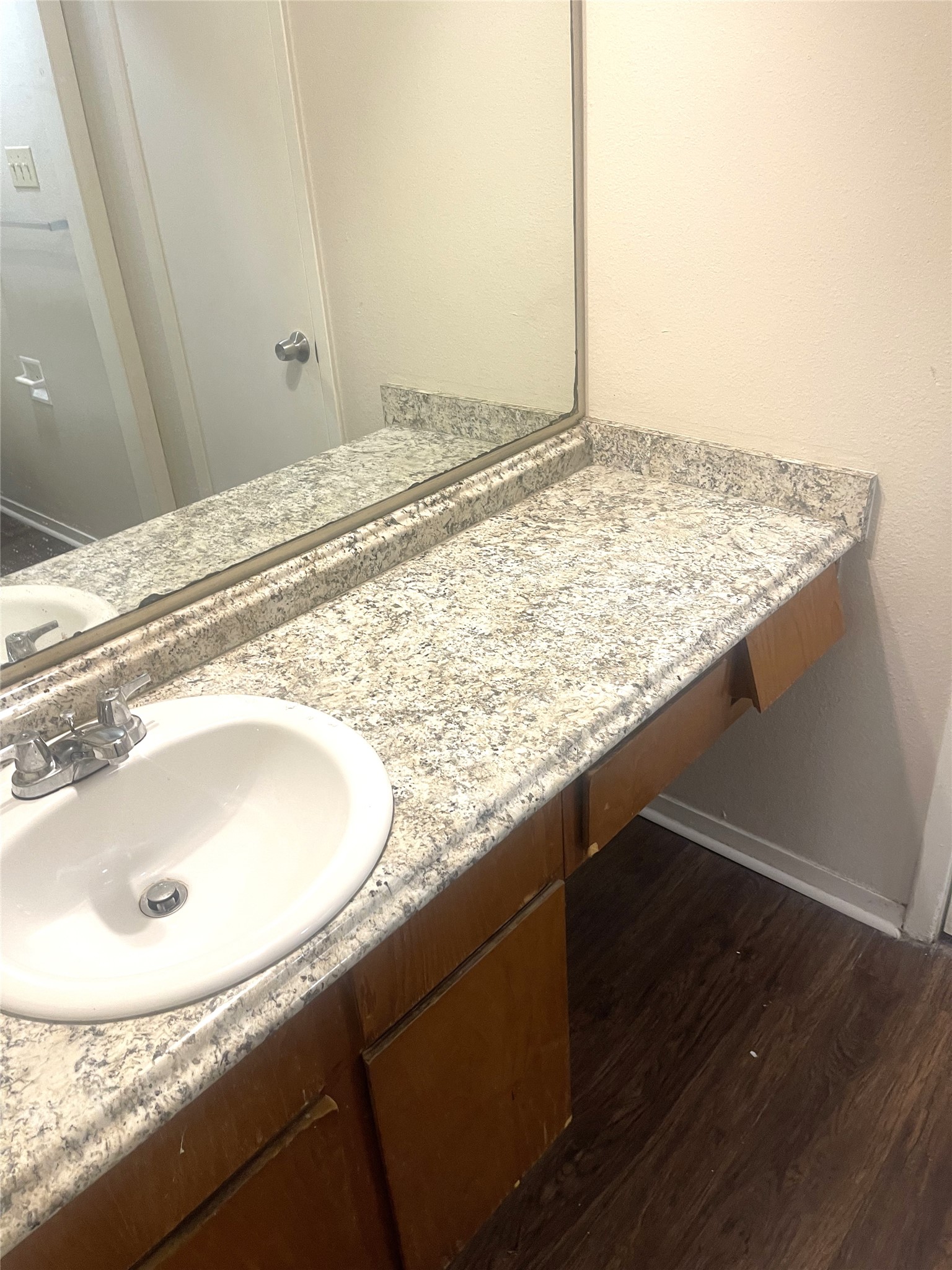 2005 West Loop, Unit D2 Austin, TX 78758 - Photo 7 of 31 a bathroom with a granite countertop sink and vanity