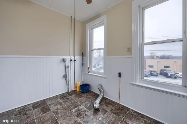 a view of a room that has a window in it