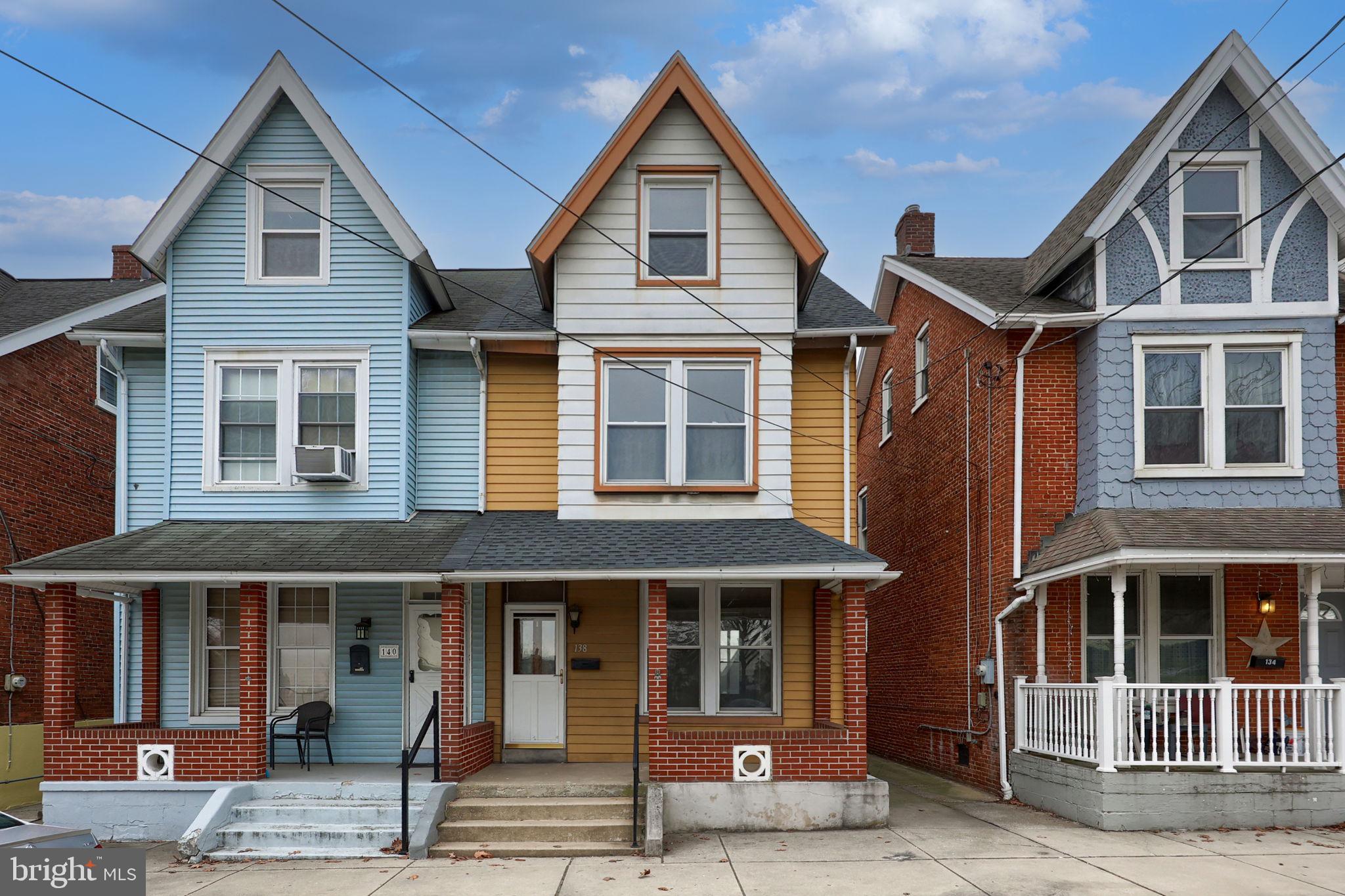 138 South 6th Street Columbia, PA 17512 - Photo 28 of 28 a view of a brick house with large windows