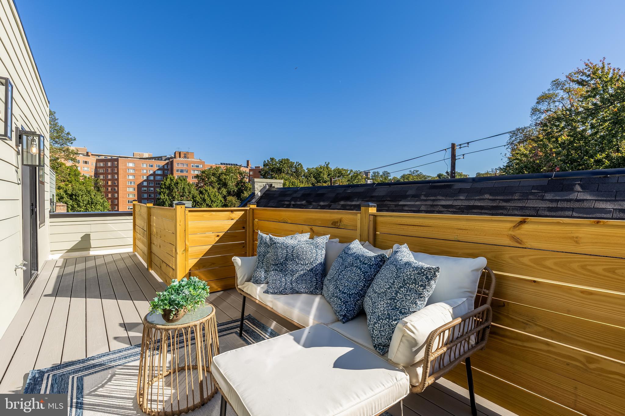 2606 41st Street Northwest, Unit PH Washington, DC 20007 - Photo 23 of 29 a view of a patio with couches and pool