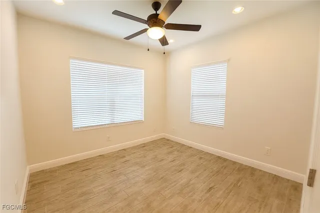 a view of an empty room with a window