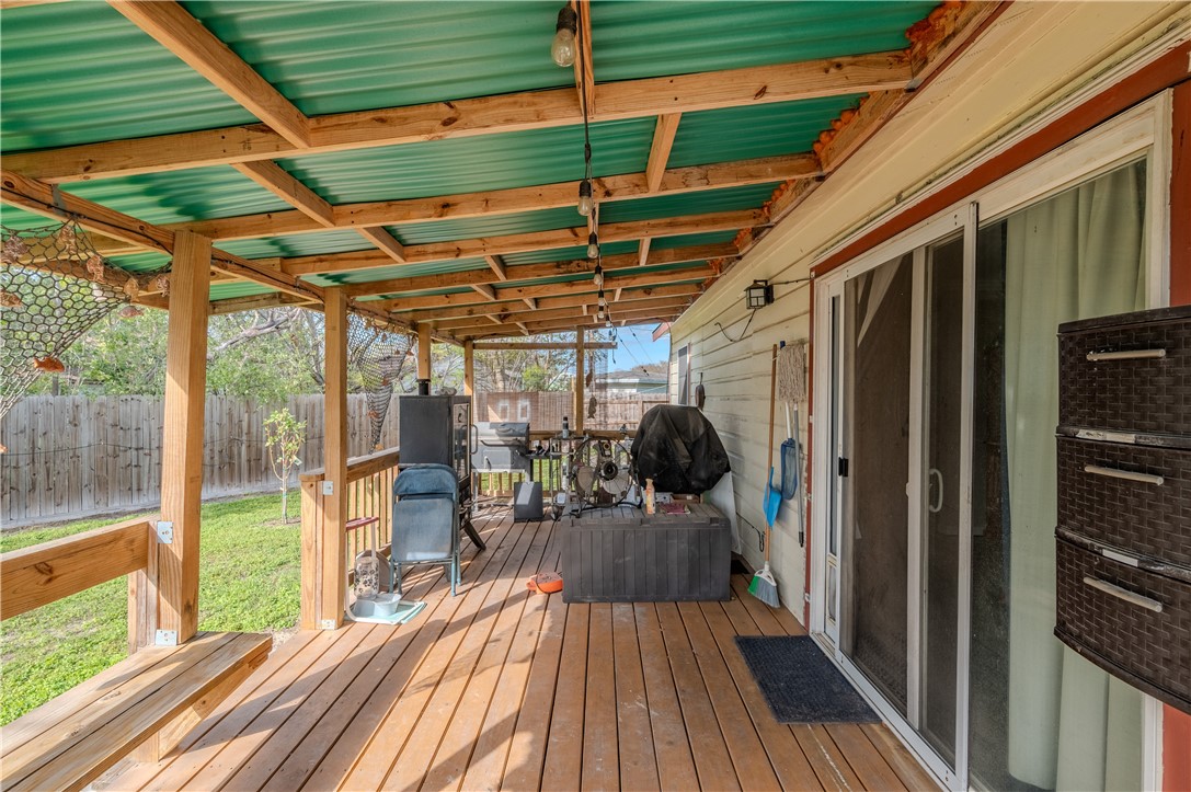 1201 Devon Drive Corpus Christi, TX 78404 - Photo 18 of 23 a view of a backyard with wooden floor and outdoor space